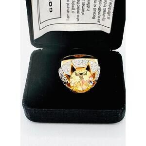 RJG designer gold tone metal faceted citrine stone with paved cz ring.